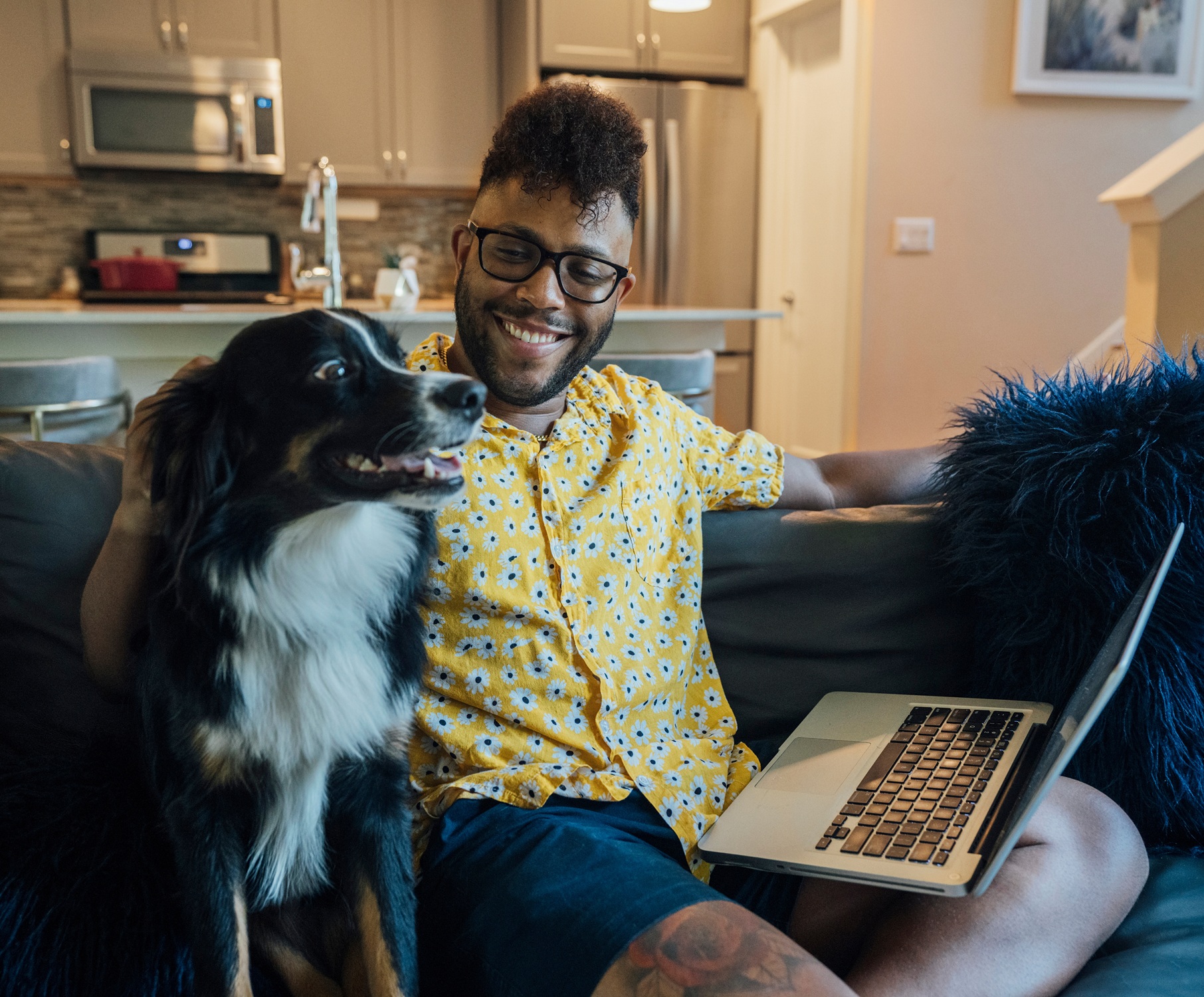 Student studying online with her dog